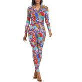 Full-length Opula print jumpsuit with long sleeves, collared V-neck, and a psychedelic bohemian pattern in blue, red, turquoise, and orange - Blissfully Brand